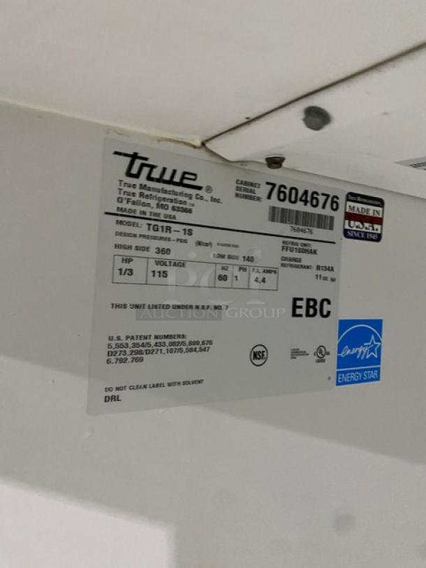 True TG1R-1S stainless steel single door refrigerator, Energy Star certified, with poly coated wired rack, on casters.