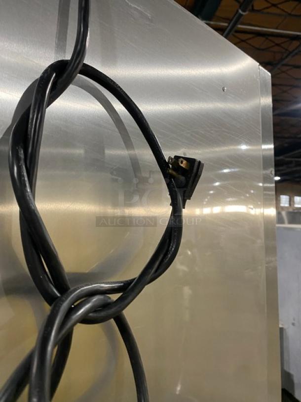 True TG1R-1S stainless steel single door commercial refrigerator on casters, showing power cord. Energy Star certified.