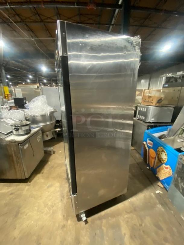 Atosa B-Series commercial stainless steel freezer, model MCF8701, on casters; single glass swing door, poly coated wired rack.