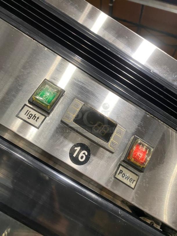 Atosa MCF8701 stainless steel merchandiser freezer control panel with digital display, light, and power switches, labeled "16".
