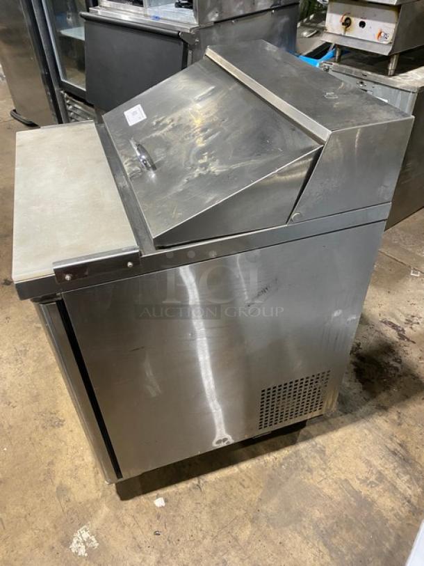 Turbo Air MST-28 single door stainless steel refrigerated prep table with cutting board, on casters, used condition.