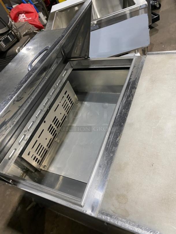 Turbo Air M3 Series MST-28 refrigerated bain marie prep table, stainless steel, single door, with cutting board and casters.