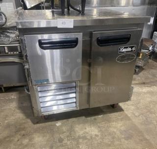 Leader LB36SC commercial stainless steel 1-1/2 door worktop refrigerator, model LB36 S/C, with poly coated rack, on casters.