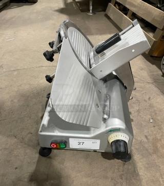 Commercial electric countertop deli meat slicer, model 26MSC001, 110V, on legs, semi-automatic, with control knobs.