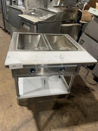 Prepline EST302O stainless steel 2-well electric steam table with cutting board, undershelf, 120V, on legs, SN: 2302202304030004.