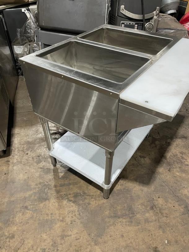 Prepline EST30-2O stainless steel 2-well hot food table, cutting board, single undershelf, 120V, on legs. Serial: 2302202304030004.