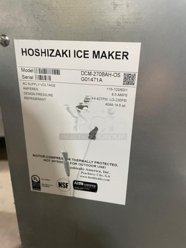 Hoshizaki DCM-270BAH-OS ice maker label, model and serial number visible. Features 115-120V, 1 phase, UL and NSF certified.