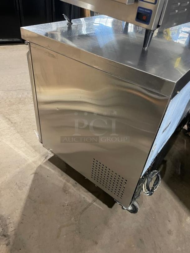 Avantco stainless steel 2-door undercounter refrigerator, model 178TUC48R, with poly-coated rack, on casters, 115V power.