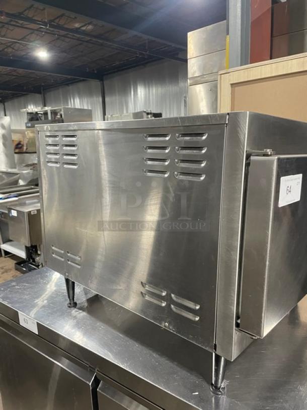 Cleveland Range 21CET8 Ultra 3-Pan Convection Steamer, stainless steel, electric, with pan rack, countertop model, on legs.