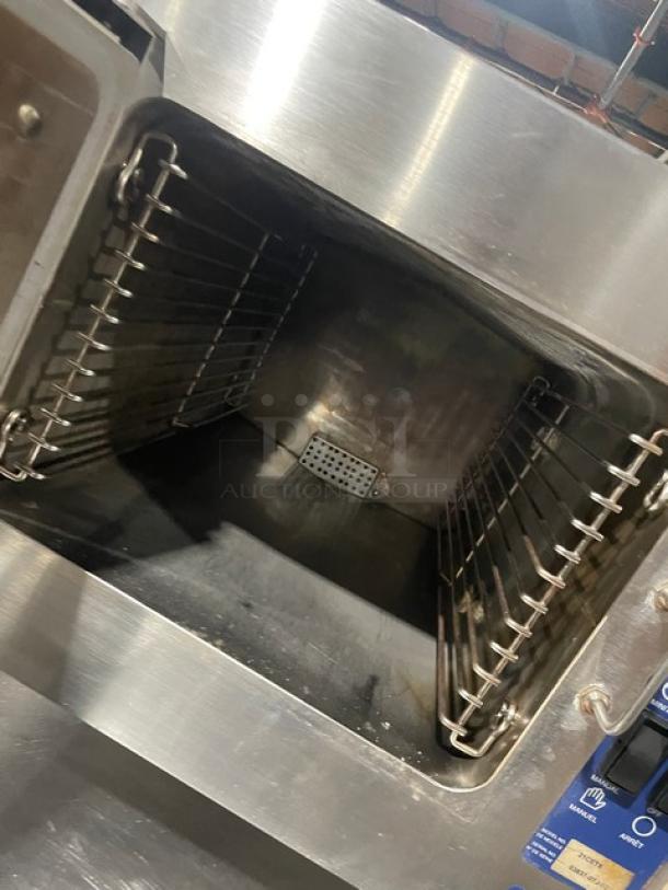 Cleveland Range Steam Craft 21CET8 electric countertop steamer, stainless steel, built-in pan rack, on legs, model and serial markings.