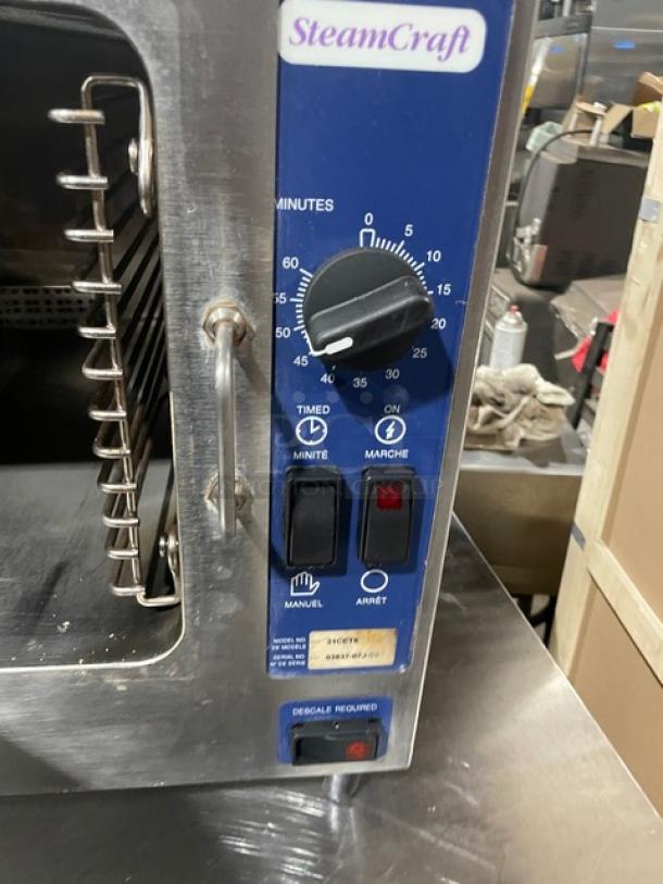 Cleveland Range SteamCraft 21CET8 countertop convection steamer, stainless steel, with timer and control panel, on legs.