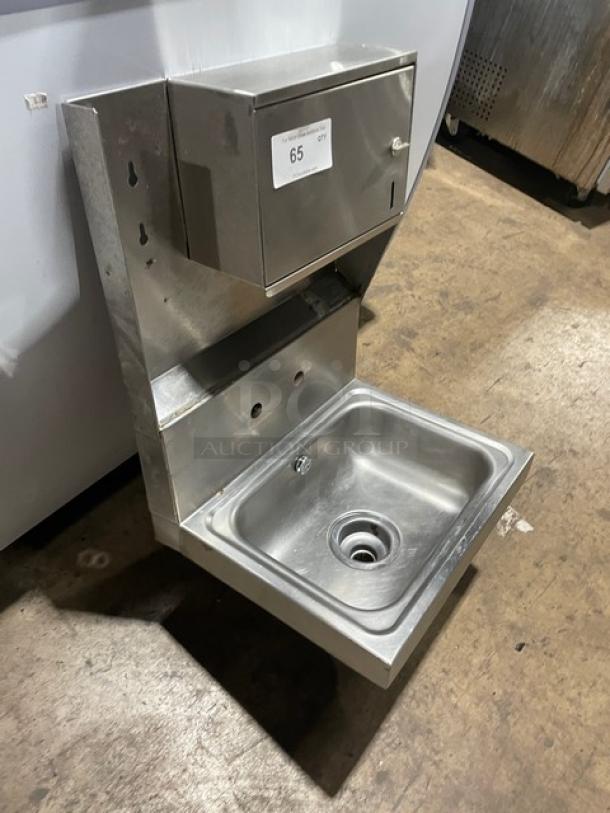 Advance Tabco stainless steel wall-mount hand sink with backsplash and built-in paper towel dispenser. Good condition.