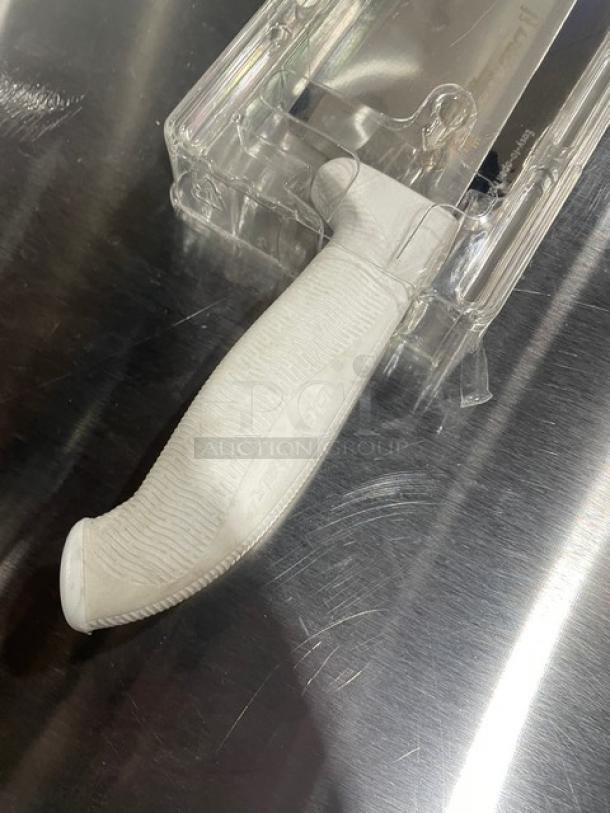 Brand new Dexter Russell SofGrip 7" Santoku knife, model SG144-7GE-PCP, with white grip handle, in packaging.