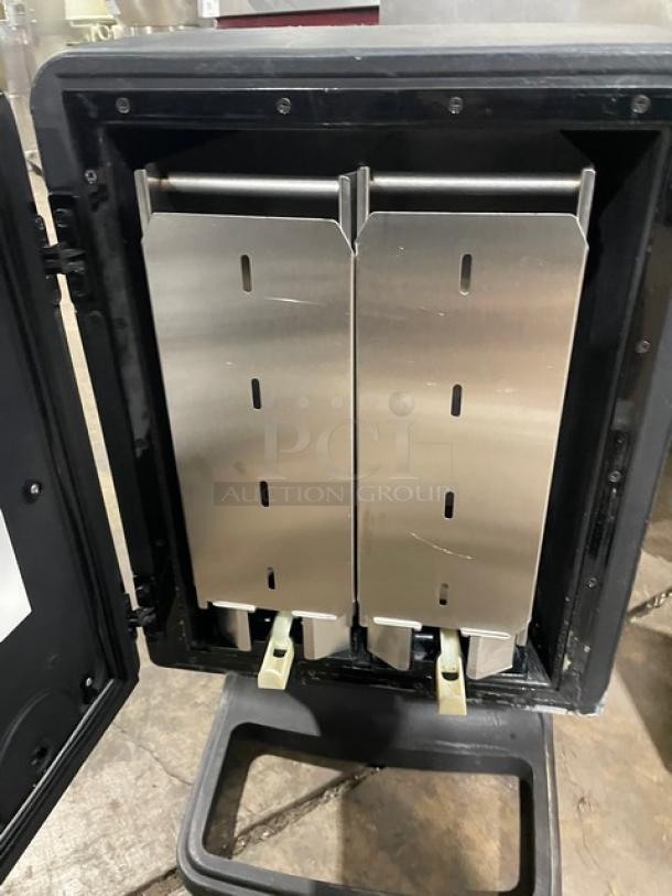 Bolla black electric dual-flavor iced coffee dispenser with stainless steel hopper and push button control, open view.