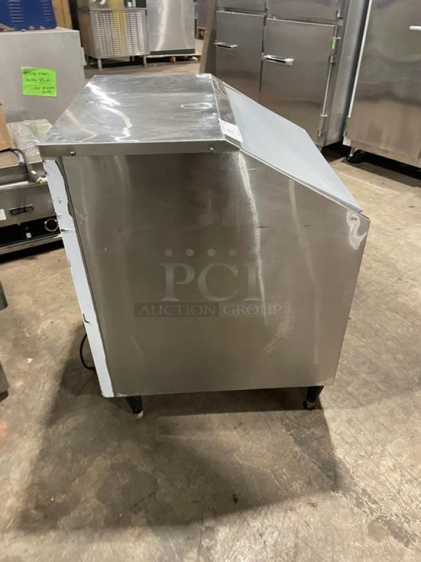 Kold-Draft SC201AC stainless steel undercounter ice machine/bin combo, air-cooled, 115V, on legs, visible wear.