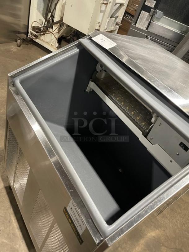 Kold-Draft SC201AC stainless steel ice machine, electric, air-cooled, undercounter, 115V, on legs, open lid showing interior.