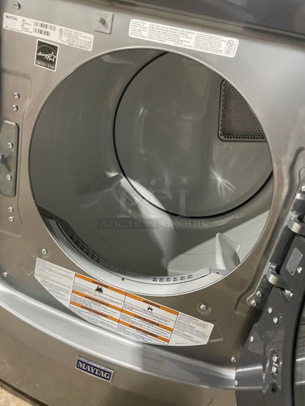 Maytag Commercial gray front-load dryer, model MGD5630HC3. Natural gas, Energy Star certified, with Extra Power and Quick Dry features.