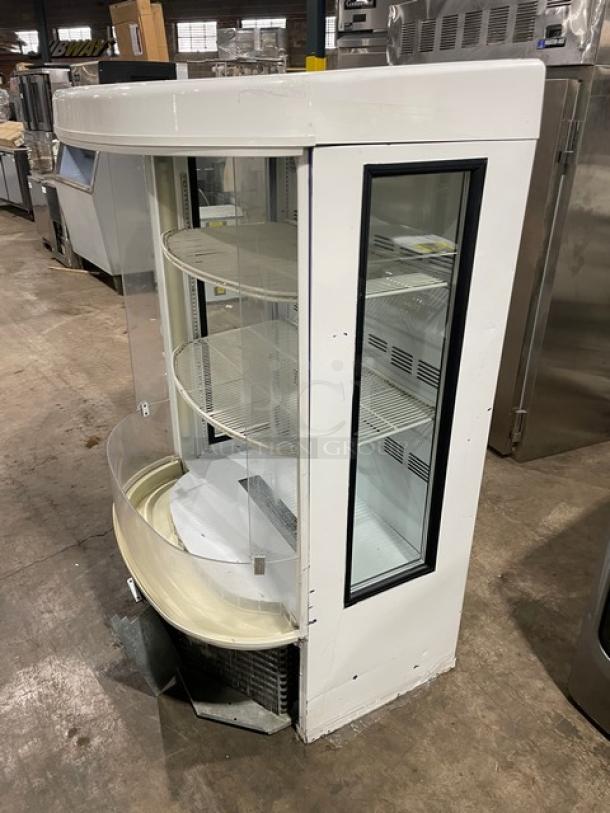 Beverage-Air BZ16GE refrigerated display case, curved glass, white finish, multi-tier racks, open grab-n-go style, model tag visible.