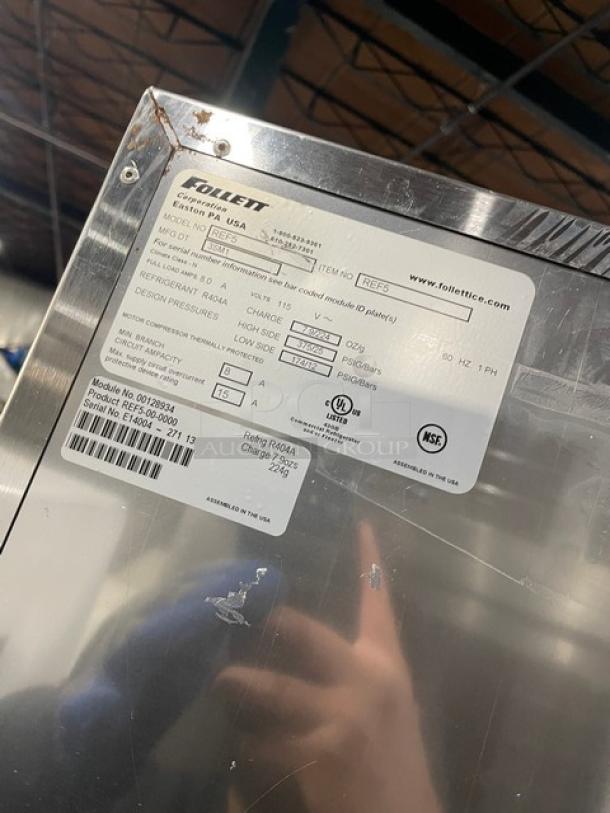 Follett REF5 commercial stainless steel undercounter medical-grade refrigerator, SN: E14004-27113, 115V, 1 Phase. Features poly-coated wired rack, NSF certified label visible.