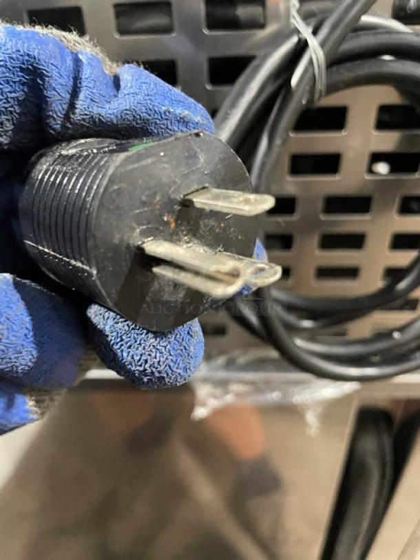 Follett REF5 commercial stainless steel refrigerator plug detail, showcasing a 115V 1-phase power connection.