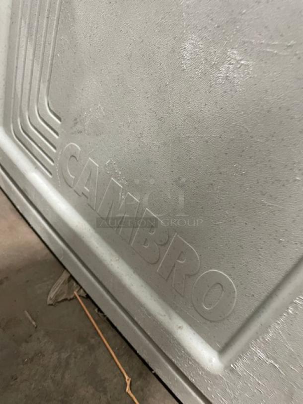 Cambro Ultra Series gray insulated food pan carrier, front-loading. Speckled finish, embossed "CAMBRO" logo. Good condition.