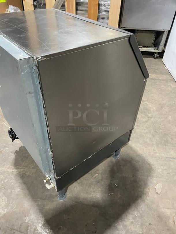 Manitowoc NEO Series stainless steel ice machine, model UYF0140A161B, air-cooled, on legs, good condition, 115V, 1 phase.
