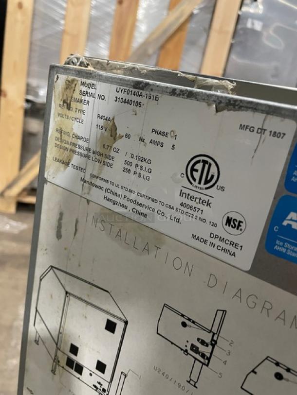 Manitowoc NEO Series UYF0140A-161B commercial ice maker with visible model/serial tag, on legs, stainless steel, 115V.