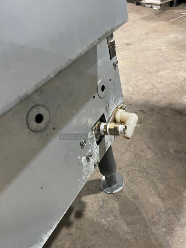 Manitowoc NEO Series ice machine, model UYF0140A-161B, stainless steel, electric-powered, air-cooled, on legs, visible connections.