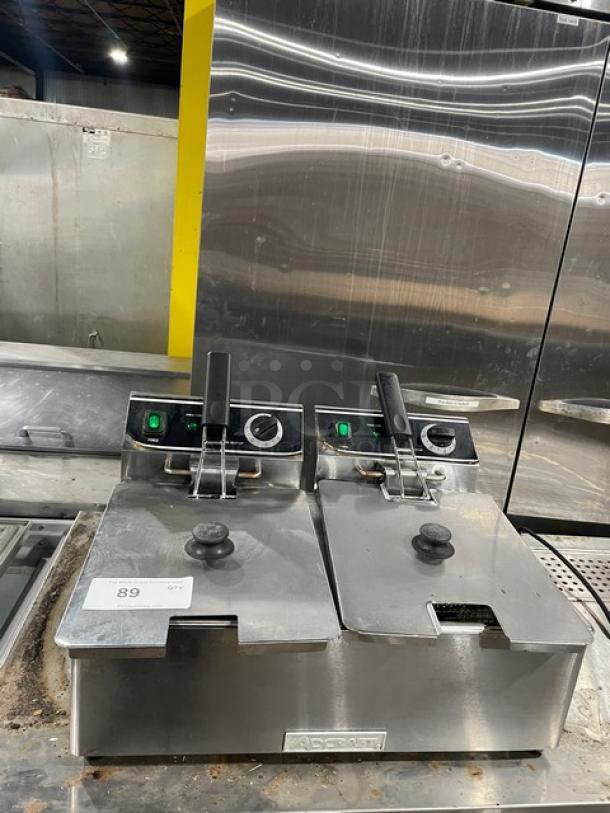 Adcraft DF6L2 stainless steel dual-tank 6L fryer, electric, with knobbed lid, mesh baskets, and visible controls, model DF-6L/2.
