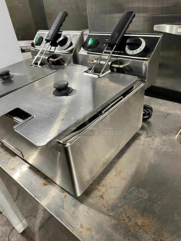 Adcraft DF6L2 stainless steel dual-tank deep fryer with knobbed lid and mesh fry basket, model DF-6L/2, 120V, used condition.