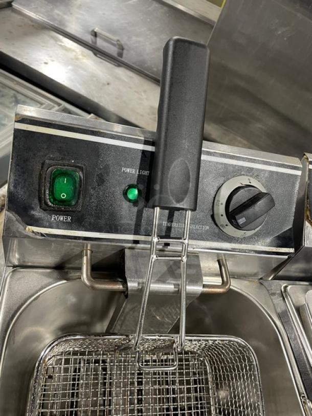 Adcraft DF6L2 countertop dual-tank fryer, stainless steel, electric, with knobbed lid, mesh fry basket; Model: DF-6L/2, 120V.