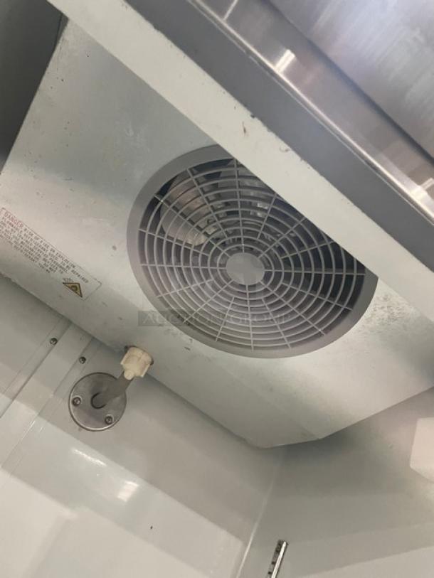 Avantco 178A19RHC refrigerator interior fan detail, stainless steel, poly-coated wire rack, model label visible.