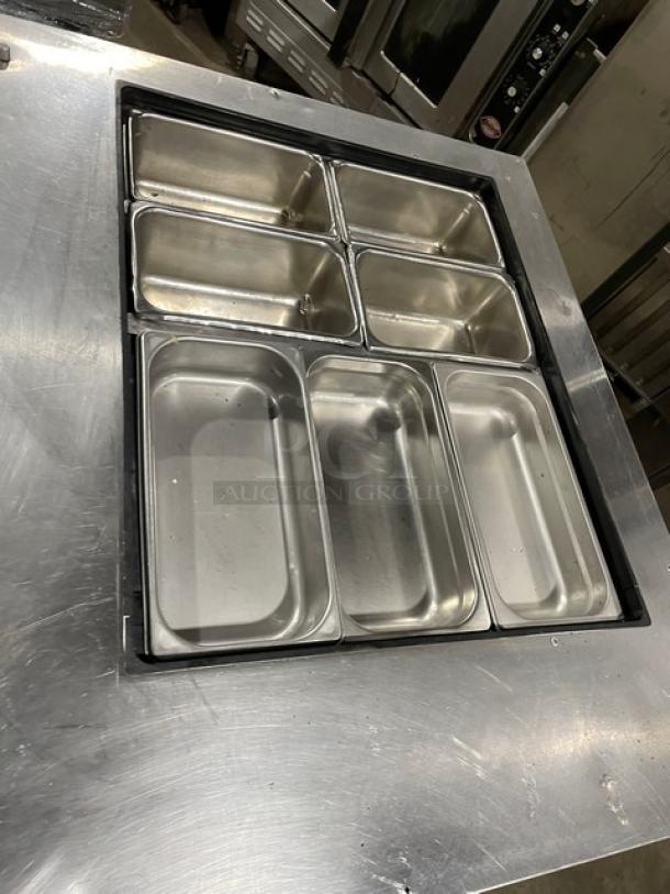 True Commercial Stainless Steel 2 Door Refrigerated Prep Table TSSU-36-12M-B, model showing inset steamtable pans, on casters.