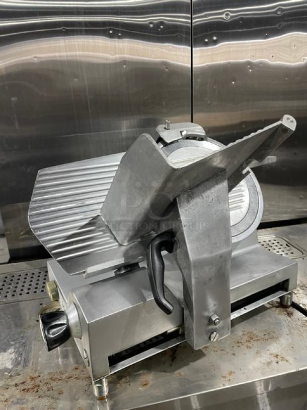 Avantco commercial electric deli meat slicer, heavy-duty countertop model, silver finish, sturdy legs, used condition.