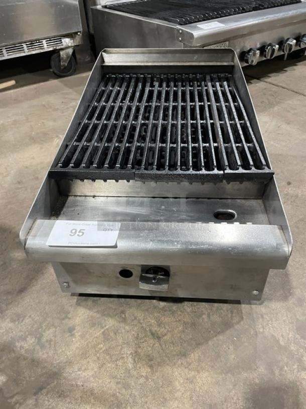 Commercial stainless steel natural gas char broiler with cast iron grate, excellent condition, countertop model.