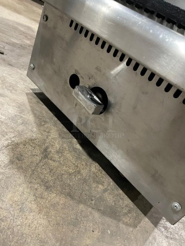Commercial stainless steel natural gas countertop char broiler with cast iron grate. Durable and efficient.