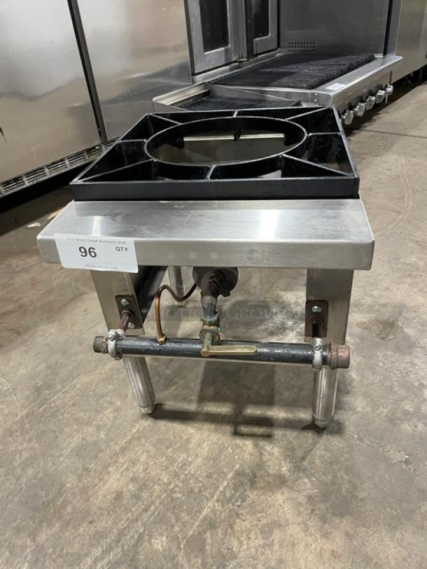 Commercial stainless steel single burner stock pot range on legs, natural gas powered, sturdy construction, excellent condition.