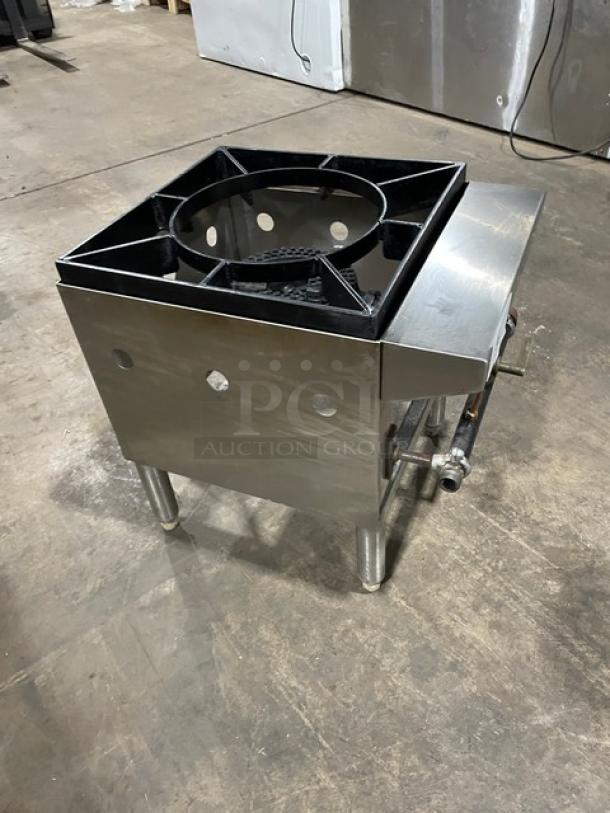 Commercial stainless steel natural gas single burner stock pot range on legs, clean condition, durable construction.