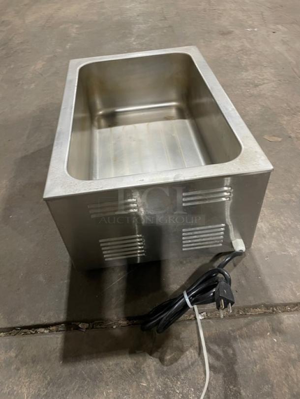 Avantco 177W50CKR stainless steel electric countertop food warmer, full-size single well, shown unplugged on concrete floor.