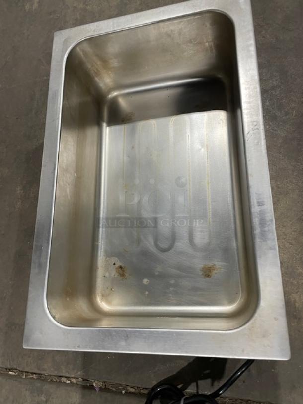 Avantco 177W50CKR stainless steel food warmer, countertop model. Full-size, single well with visible wear. Electric, 120V.