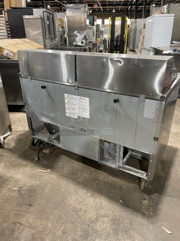 Turbo Air M3 Series 2-door refrigerated prep table, model MST-60-24-N, stainless steel, with casters and wired rack.