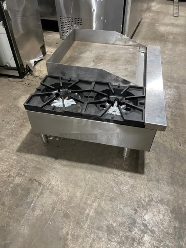 Comstock-Castle FHP36-24 stainless steel 2-burner countertop griddle range with back and side splash. Natural gas powered.