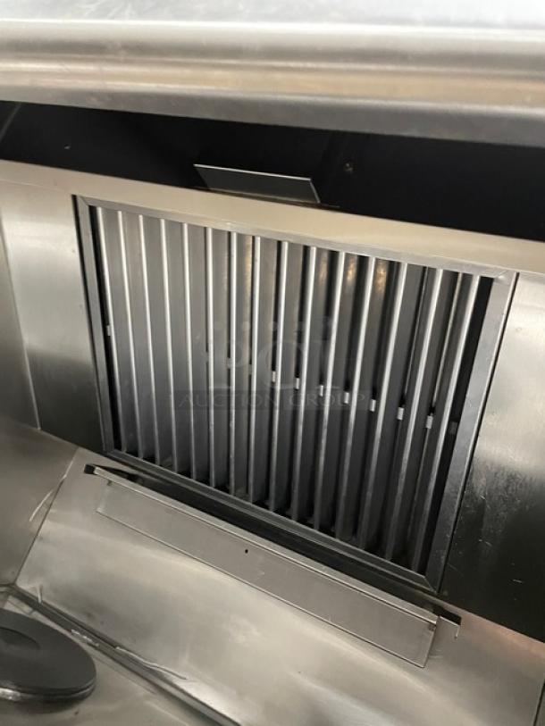 Wells VCS2000 stainless steel ventless cooking system with French hot plates, convection oven base, and built-in Ansul system.