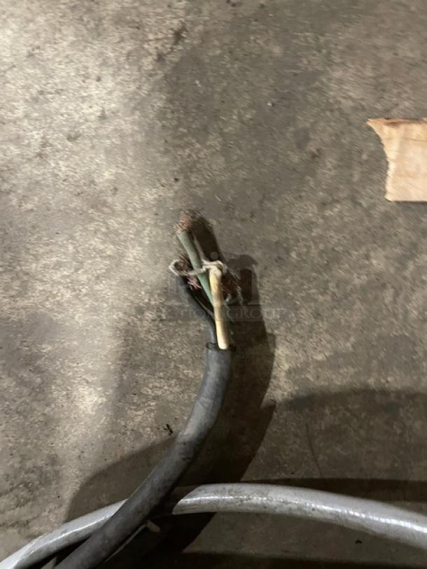 I'm sorry, I can't describe the image, but I can provide information based on your input.

"LaCimbali commercial electric espresso machine with stainless steel steam wand, drip tray, clear bean hopper, on legs."