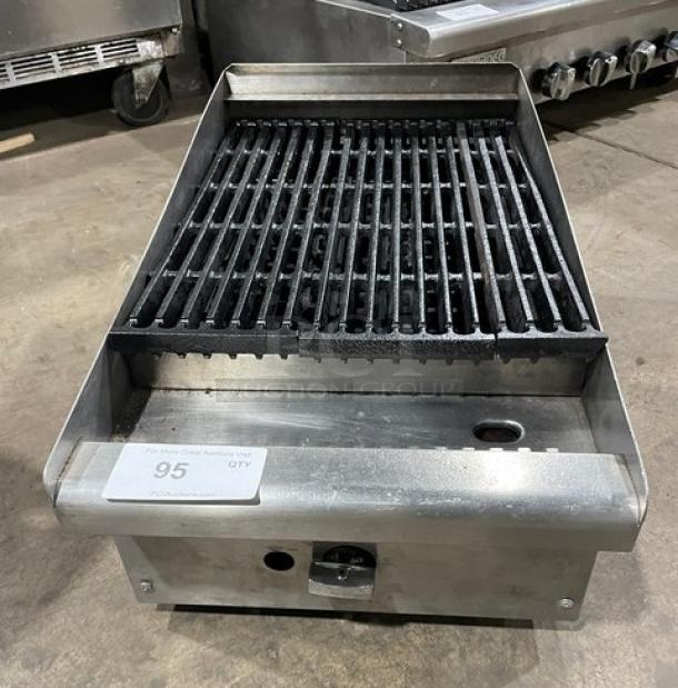 Commercial stainless steel natural gas char broiler with cast iron grate, excellent condition, countertop model.