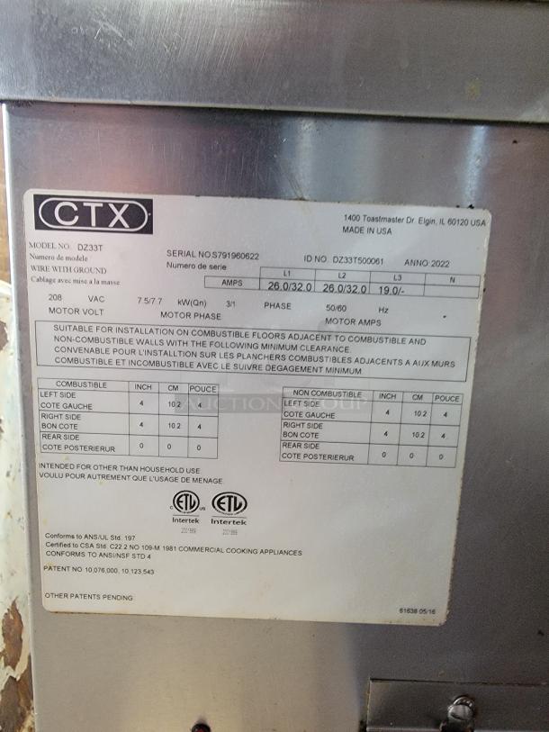 2022 CTX DZ33T Double Stack electric infrared conveyor oven by Middleby Marshall. Model info and safety labels visible.