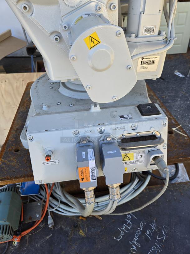 ABB IRB 260 industrial robot arm, 61" reach, 66 lb capacity, shown with control wiring. Equipped for coding control.