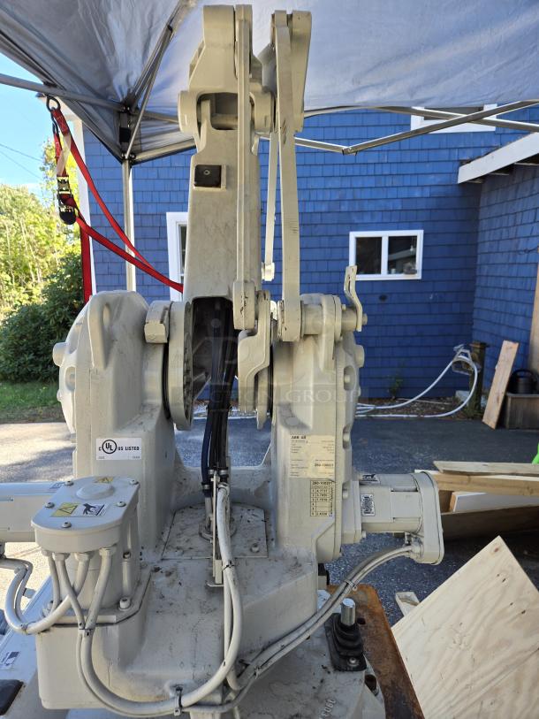 ABB IRB 260 industrial robot arm, 61" reach, lifts 66 lbs. Includes coding controller pendant. UL listed, used condition.