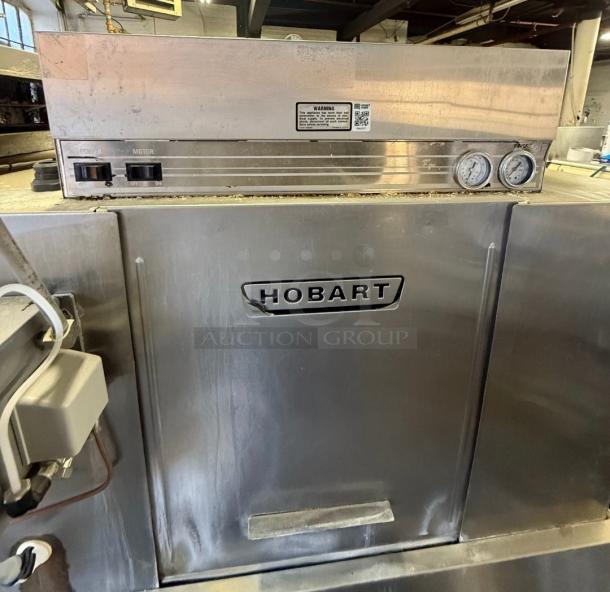 Hobart CRS-66A conveyor dishwasher, stainless steel, industrial-grade, visible branding, controls, and condition wear. Ideal for high-volume use.