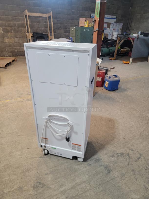 Abatement Technologies HC800FUV air purifier, medical-grade, portable, HEPA filter, white, on wheels, clean condition.